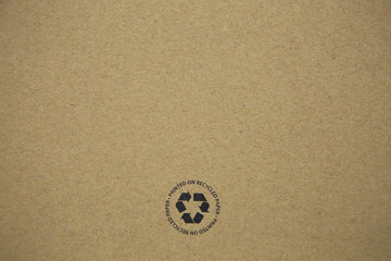 Fototapeta na wymiar recycle logo on carton