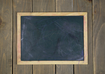 empty blackboard on wood background