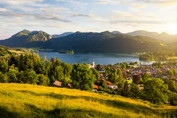 Poster View of mountains and mountain lake during sunset in summer. Beautiful town of Schliersee in Bavaria, Germany, Europe. © VOJTa Herout