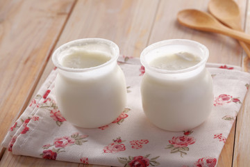 Two jars of yogurt