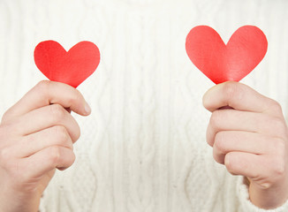 Fototapeta premium woman holding love heart object in hand for valentine day