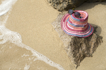 Fototapeta na wymiar Hat on a beach