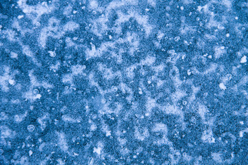 Texture of the ice surface. Winter background