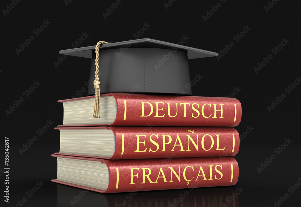Poster graduation cap and stack of dictionaries. image with clipping path