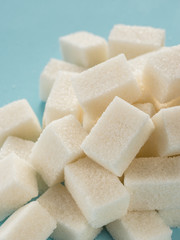 background of white sugar cubes