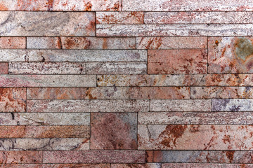 Wall of Indian sandstone with a beautiful structure, decorative building facing material