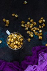 Homemade Golden Caramel Popcorn in a cup
