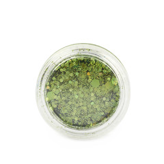 Round box of sequin bits isolated