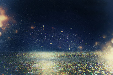 glitter lights background. gold, blue and black