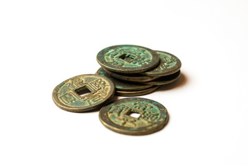 Ancient bronze coins of China on white