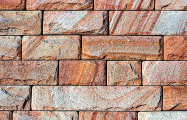 Wall of Indian sandstone with a beautiful structure, decorative building facing material