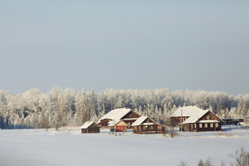 Fototapeta na wymiar Winter landscape in the countryside forest snow field