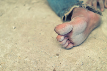 hopeless man feet tied together with rope