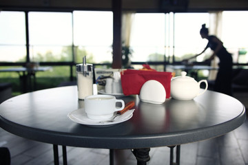 cup of tea or coffee in a cafe serving breakfast table