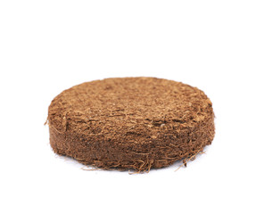Compressed compost tablet isolated