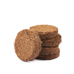 Compressed compost tablet isolated