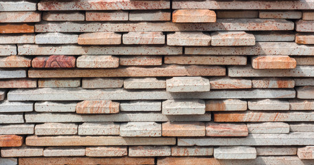 Wall of Indian sandstone with a beautiful structure, decorative building facing material