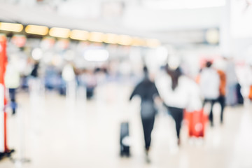 Fototapeta na wymiar Blurred background,Traveler with baggage at Terminal Departure C