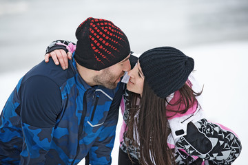 Enthusiastic Love Couple Exercising Outdoors.