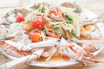 Spicy papaya salad with blue crab sea food.