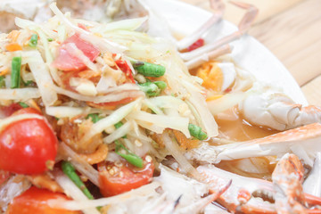 Spicy papaya salad with blue crab sea food.