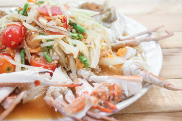 Spicy papaya salad with blue crab sea food.