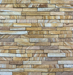 Wall of Indian sandstone with a beautiful structure, decorative building facing material