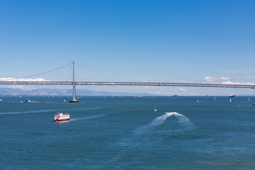 Red and White Ferry Heading for Bay Bridge