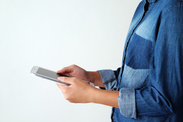 Hand holding tablet over white background, mock up, business and technology, digital marketing