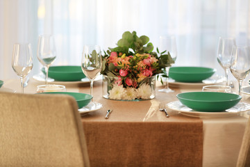 Elegant table setting with beautiful flowers