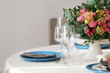 Table setting with beautiful flowers for dinner