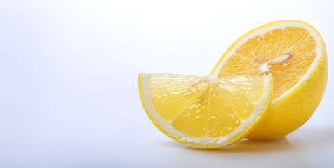 sliced lemon closeup isolated on a white background