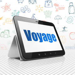 Tourism concept: Tablet Computer with Voyage on display
