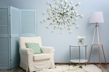 Modern room decorated with flower garland