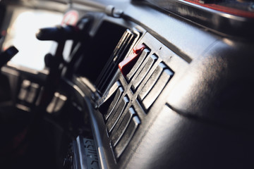Panel in cabin of big modern truck, closeup