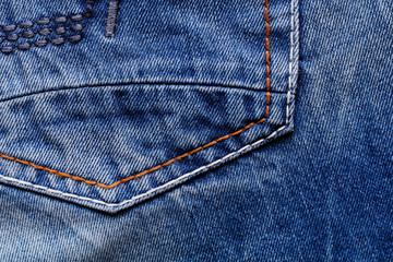The pocket of blue jeans