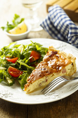 Savory pie with cream, bacon and eggs
