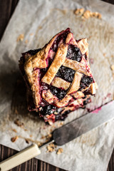 Homemade berry pie on a wooden background