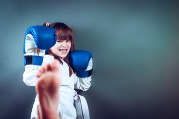 karate girl It fulfills kicks on  background