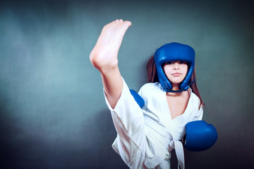 karate girl It fulfills kicks on  background © 6okean