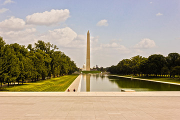 Grand view looking eastwards along the ceremonial tree-lined boulevard of the National Mall towards...