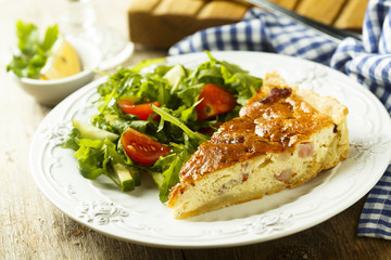 Savory pie with cream, bacon and eggs