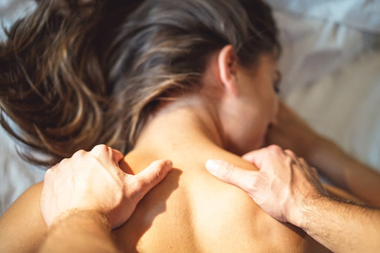 Boyfriend giving massage for his girlfriend