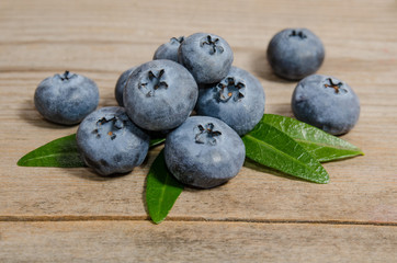 blueberries on wooden background