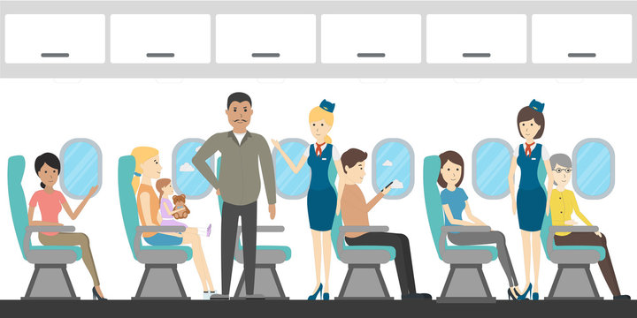 Airplane economy class interior. Flying attendants and passengers.