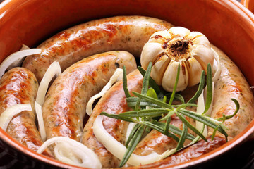 Roast sausage with rosemary and garlic