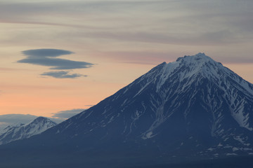 Naklejka na ściany i meble Volcanoes at sunset, Kamchatka, Russia
