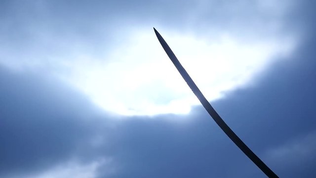 sabers silhouettes on battlefield close up slow motion