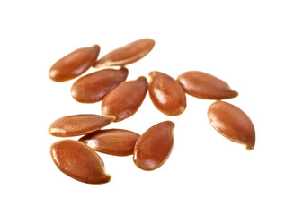 Close up of flax seeds isolated on white background. Macro image