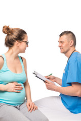 beautiful pregnant woman on reception at the doctor of the thera